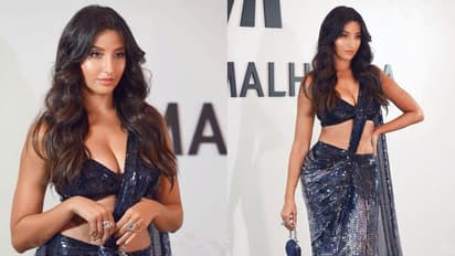 పైట పక్కకు జరిపి నోరా ఫతేహి పరువాల జాతర.. టెంప్టింగ్  పోజులతో ఊపిరి ఆపేస్తున్న పవన్ హీరోయిన్ 