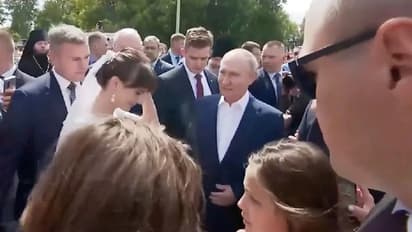 'Picture with war criminal': Bride's encounter with Vladimir Putin in Russia amid tensions goes viral (WATCH)
