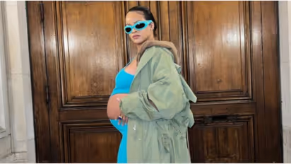 Rihanna flaunts baby bump in white crop top, unbuttoned jeans; Check out photo