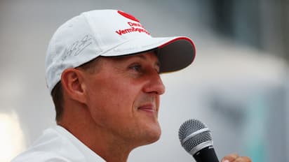 What does Michael Schumacher's rare public act for charity mean for F1 fans?
