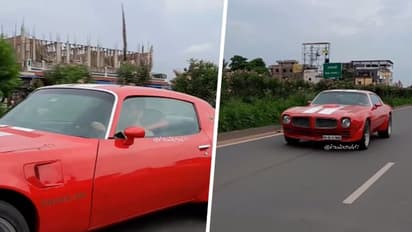 WATCH vintage Mahi: MS Dhoni drives red 1973 Pontiac Trans-Am in Ranchi; leaves internet awestruck