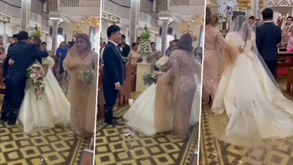 WATCH: Bride walks down flooded aisle after Typhoon Doksuri in Philippines; video goes viral