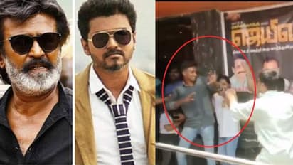 தளபதி விஜய் ரசிகரை தரதரவென இழுத்துபோட்டி தர்ம அடி கொடுத்த ரஜினி ரசிகர்கள் - வைரலாகும் வீடியோ