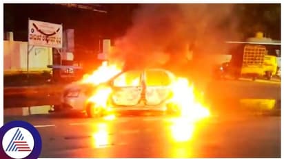 நடுரோட்டில் கொழுந்து விட்டு எரிந்த கார்.!  விபத்தில் சிக்கி ஹோட்டல் உரிமையாளர் உடல் கருகி பலி