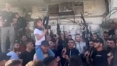 WATCH: Videos of Palestinians celebrating Hamas-led group's attack on southern Israel goes viral