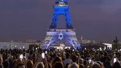 Eiffel Tower in Paris lit up in blue to show France's solidarity with Israel amid Hamas attack | WATCH