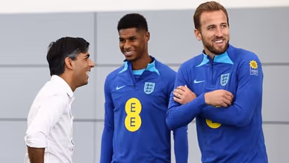 Rishi Sunak engaged in conversations with England's football stars Harry Kane and Marcus Rashford