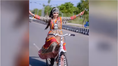 Daring viral video: Woman skips rope while riding a bicycle; leaves internet divided (WATCH)