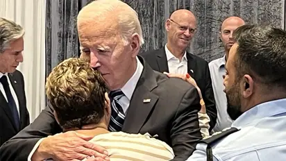 Viral photo: Biden hugs Israeli woman who tricked Hamas operatives with cookies, coffee
