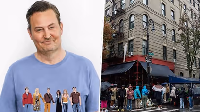 Matthew Perry fans pay tribute by leaving flowers, candles outside the iconic 'Friends' apartment
