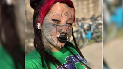 പൂച്ചയെപ്പോലെയാകണം, ടാറ്റൂവും പിയേഴ്സിങ്ങുമടക്കം യുവതി നടത്തിയത് 20 ബോഡി മോഡിഫിക്കേഷൻ