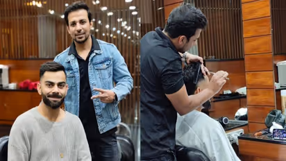 முடி வெட்டிக் கொண்டே நியூசிலாந்து – பாகிஸ்தான் போட்டியை பார்த்த விராட் கோலி!