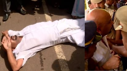 സംരംഭം ചുവപ്പ്നാടയില്‍, പഞ്ചായത്തിനു മുന്നില്‍ പ്രതിഷേധിച്ച പ്രവാസിയെ പൊലീസ് നീക്കി, നടുറോഡില്‍ കിടന്ന് സമരം