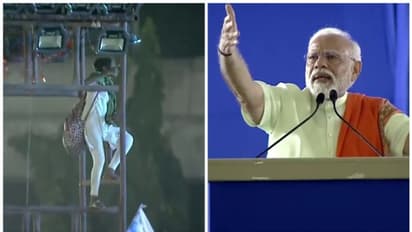 പ്രധാനമന്ത്രിയുടെ തെരഞ്ഞെടുപ്പ് റാലിക്കിടെ ലൈറ്റ് ടവറിൽ കയറി യുവതി; പറയാനുള്ളത് കേള്‍ക്കാമെന്ന് മോദി - വീഡിയോ