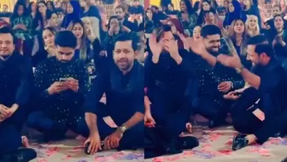 WATCH: Babar Azam's reaction to notes being showered at Imam-ul-Haq's wedding Qawwali night goes viral