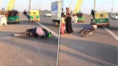 Viral video: Delhi man hits cyclist while performing stunt on Signature bridge in moving auto