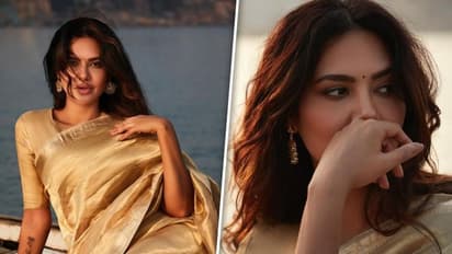 Photos: Esha Gupta enjoys boat ride in Varanasi donning saree