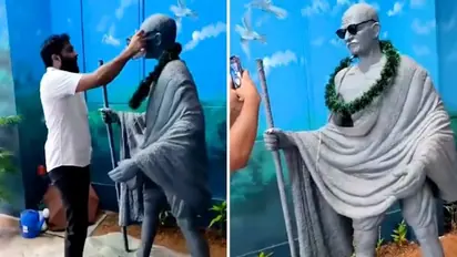 Kerala: Left-backed SFI leader booked for placing shades over Mahatma Gandhi’s statue (WATCH)