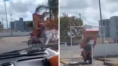 എടാ, ഇതിങ്ങനെയൊന്നുമല്ലടാ; ടിവിയുമായി ടു വീലറിൽ, എല്ലാം കൂടി മറിഞ്ഞുകെട്ടി താഴെ