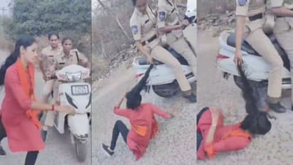 സമരത്തിനിടെ അറസ്റ്റ് നീക്കം: ഓടി രക്ഷപ്പെടാൻ ശ്രമിച്ച എബിവിപി പ്രവർത്തകയുടെ മുടിയിൽ പിടിച്ച് വീഴ്ത്തി പൊലീസ്