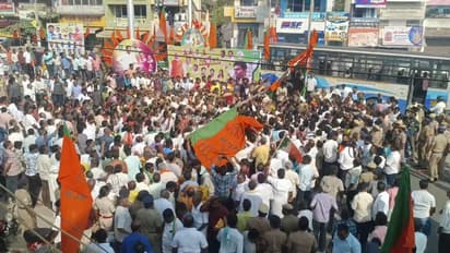 அண்ணாமலைக்காக அமைக்கப்பட்ட பிரமாண்ட கொடி கம்பம் சரிந்து விபத்து; வேடிக்கை பார்த்த நபர் படுகாயம்