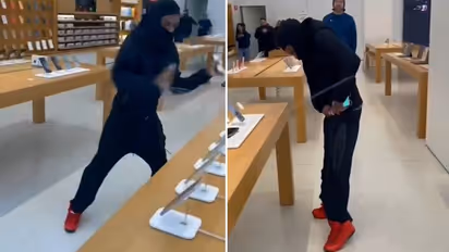 Masked man steals 50 iPhones from US Apple store in broad daylight, video goes viral (WATCH)