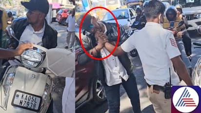 Bengaluru motorist bites traffic police's hand during heated altercation (WATCH)