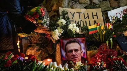 Russian Orthodox Church suspends priest for leading Putin critic Alexei Navalny's memorial service