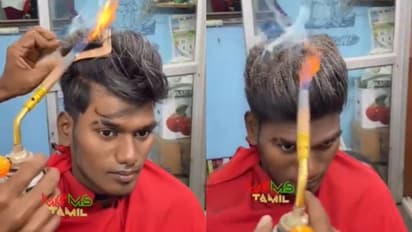 ഉഫ് തീ തന്നെ; കത്രികയില്ല, ചീപ്പും തീയും മാത്രമുപയോ​ഗിച്ച് മുടിമുറിച്ച് ബാർബർ, സംഭവിച്ചത് കണ്ടോ?