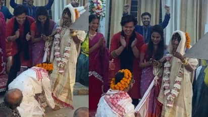 വധുവിന്റെ കാൽതൊട്ട് വന്ദിച്ച് വരൻ, കയ്യടിച്ച് കുടുംബം, വിമർശിച്ചവര്‍ക്ക് ചുട്ട മറുപടി