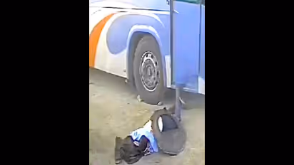 Viral Video: Shocking CCTV footage reveals bus driver tragic death in tyre blast (WATCH)