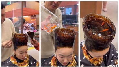 എന്തോന്നിത് ?  യുവതിയുടെ തലയില്‍ ഫിഷ് ടാങ്ക് പണിയുന്ന വീഡിയോ കണ്ട് അന്തംവിട്ട് സോഷ്യല്‍ മീഡിയ !