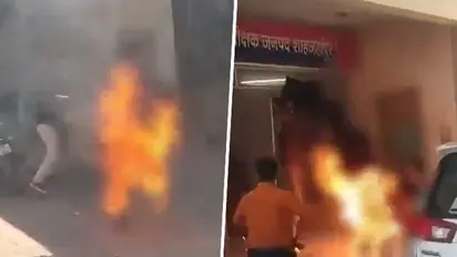 SHOCKING! Man sets himself ablaze outside police station in UP, saved by cops; WATCH viral video