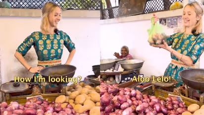 ഇന്ത്യന്‍ തെരുവില്‍ പച്ചക്കറി വിറ്റ് പച്ചപ്പനന്തത്ത പോലൊരു റഷ്യൻ സുന്ദരി