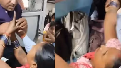 താഴെയിറങ്ങടാ നീ; സീറ്റിന് വേണ്ടി യുവാവിന്റെ കോളറിൽ കുത്തിപ്പിടിച്ച് സ്ത്രീ, പൊരിഞ്ഞ വഴക്ക്, വീഡിയോ