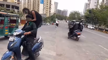 എന്തൊക്കെ കാണണം? സ്കൂട്ടറിൽ പെൺകുട്ടിയുടെ സാഹസപ്രകടനം, മൂക്കും കുത്തി താഴെ, പിഴ ചുമത്തി പൊലീസ്