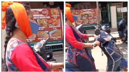 'അടക്കാൻ കൊണ്ട് പോകുവായിരിക്കും'; സ്കൂട്ടിയിൽ പോകുമ്പോൾ ഫോണിൽ സംസാരിക്കുന്ന യുവതിയുടെ വീഡിയോ വൈറൽ