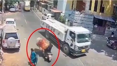 Bull's road rage in Bengaluru caught on camera: Truck driver's timely brake saves biker's life (WATCH)