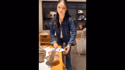 Viral Video: Human or machine? Video of waitress at chinese eatery sparks online debate