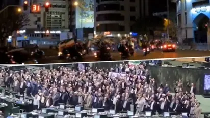 Celebrations erupt in Iranian Parliament, across country's streets after multi-front attack on Israel (WATCH)