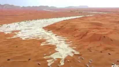 Dubai floods: Dramatic aerial video of torrential rain waters entering city's desert surfaces (WATCH)