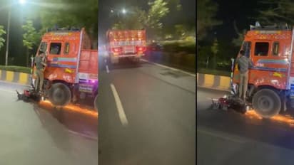 മുൻ ടയറിനടിയിൽ ബൈക്ക്, ഫുട്ബോർഡിൽ യുവാവ്, അപകടമുണ്ടാക്കിയ ലോറി കുതിച്ച് പാഞ്ഞത് കിലോമീറ്ററുകൾ