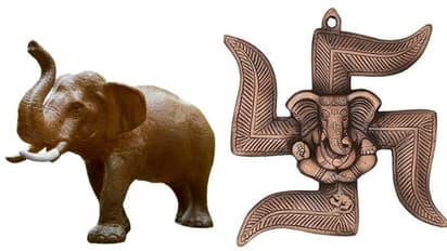 Elephant with Trunk Up to Swastika, 10 showpieces that bring good luck at home