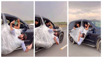 ഓടുന്ന കാറിന്‍റെ ഡോറില്‍ പൊതിഞ്ഞ് വച്ച നിലയില്‍ ഒരാള്‍; വൈറലായി ഒരു സ്റ്റണ്ട് വീഡിയോ 