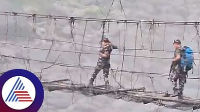 ಗುಡ್ಡ ಹತ್ತಿ, ಮಳೆಯಲ್ಲೇ ಎಷ್ಟೋ ದೂರ ನಡೆದು, ಸೇತುವೆ ದಾಟಿ ಹೋಗಿ ಮರು ಮತದಾನ ಪೂರೈಸಿದ ಚುನಾವಣಾ ಸಿಬ್ಬಂದಿ