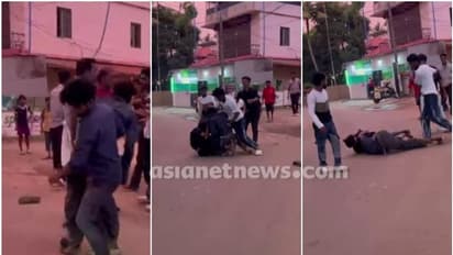 എടുത്ത ഹെൽമെറ്റ് തിരികെ വെച്ചില്ല, തൃശ്ശൂരിൽ യുവാവിനെ ഒരു സംഘം വളഞ്ഞിട്ട് തല്ലി; വീഡിയോ പുറത്ത്
