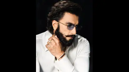 From Mumbai to New York: Brand ambassador Ranveer Singh's always in style in his vogue ivory outfit!!