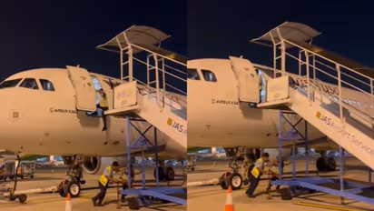 Viral Video: Terrifying moment man falls from plane in Indonesia after staff pull back stairs