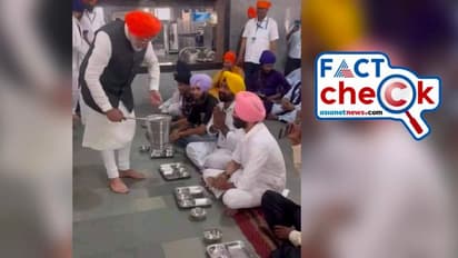 നരേന്ദ്ര മോദി വിളമ്പുന്നതായി അഭിനയിക്കുകയായിരുന്നോ, കയ്യിലെ ബക്കറ്റ് കാലിയായിരുന്നോ? Fact Check