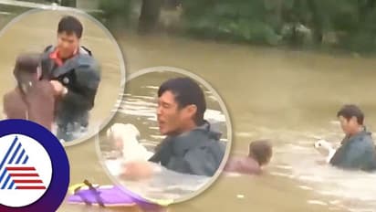 ನೀರಿನಲ್ಲಿ ಮುಳುಗುತ್ತಿದ್ದ ಕಾರಿನಿಂದ ಮಹಿಳೆ -ನಾಯಿ ಮರಿ ರಕ್ಷಣೆ, ಮೈಜುಮ್ಮೆನಿಸುವ ವಿಡಿಯೋ!